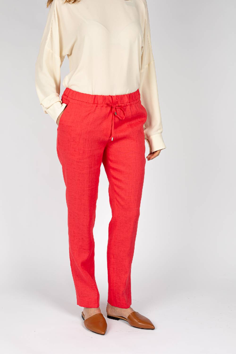 L.Pucci Pantaloni colore corallo, linea morbida Spedizione Gratuita