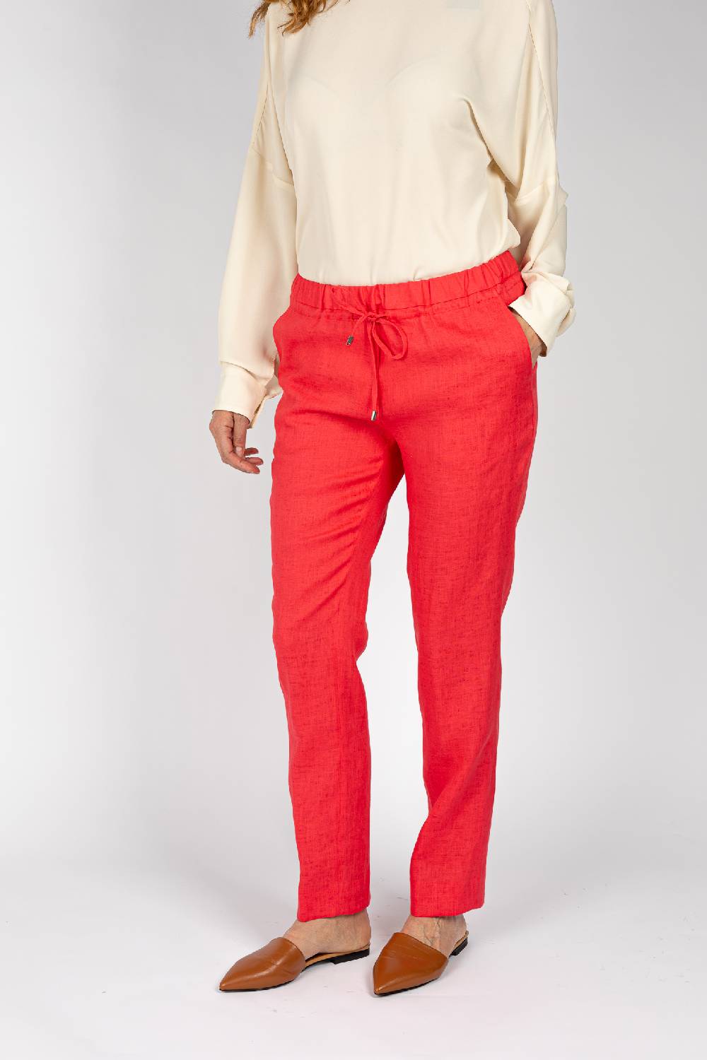 L.Pucci Pantaloni colore corallo, linea morbida Spedizione Gratuita