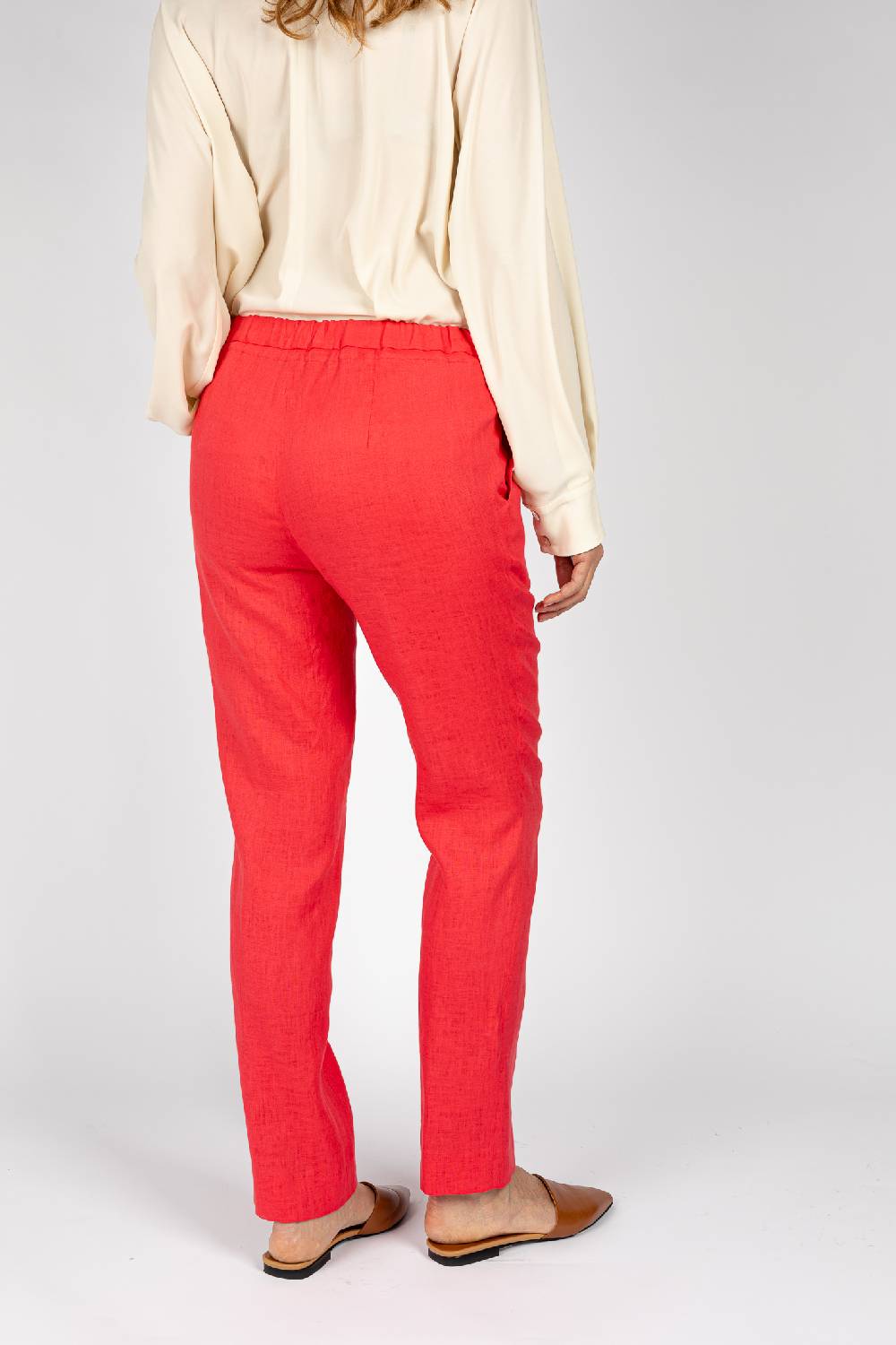 L.Pucci Pantaloni colore corallo, linea morbida Spedizione Gratuita