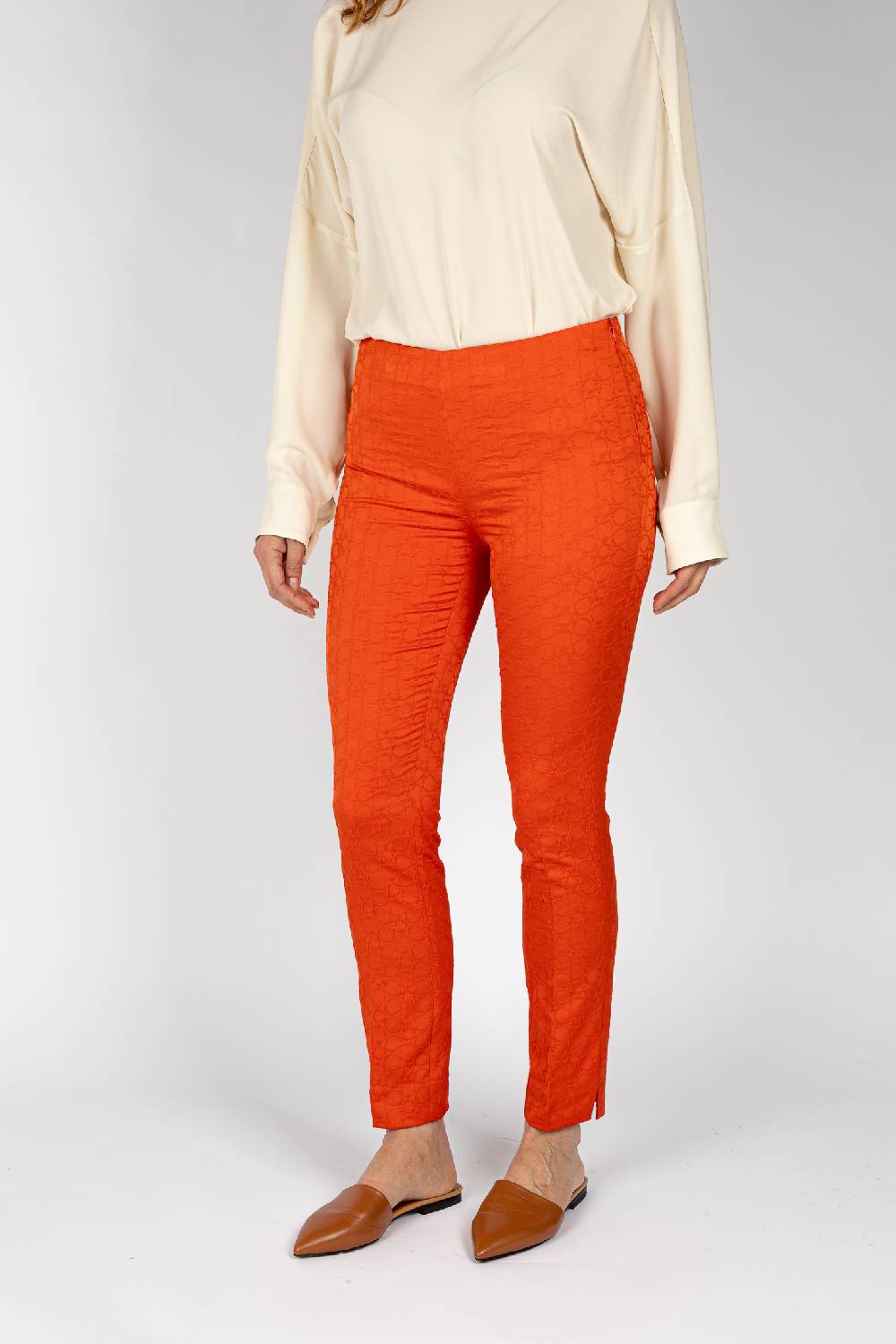 L.Pucci Pantaloni jacquard a fiore colore arancio, linea stretta Sottocosto