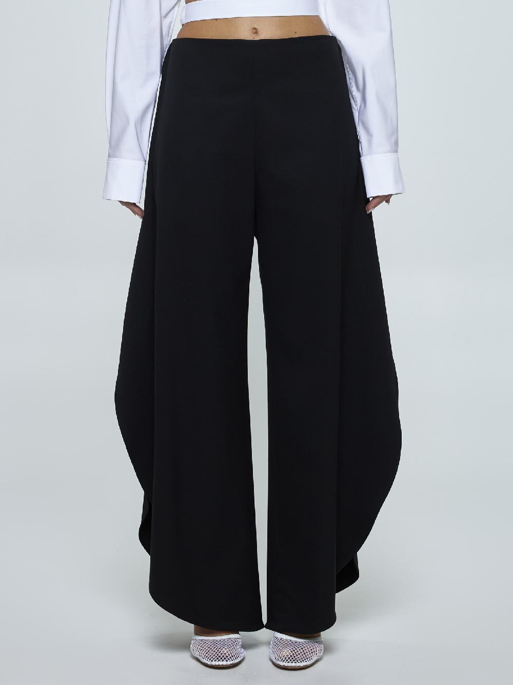 ALAÏA Pantaloni Round in lana stretch Novità