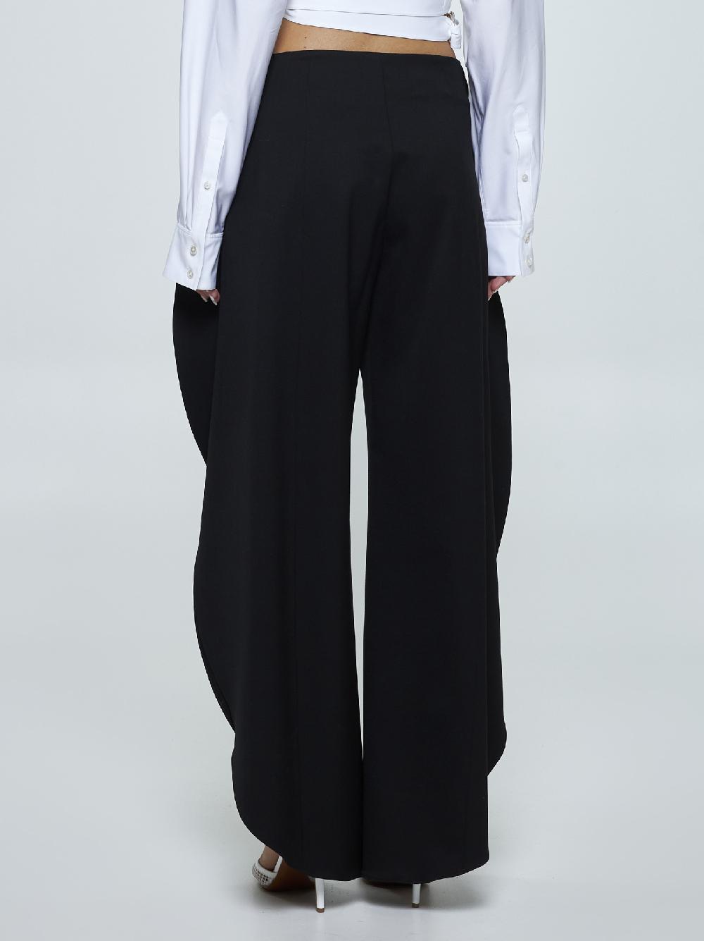 ALAÏA Pantaloni Round in lana stretch Novità