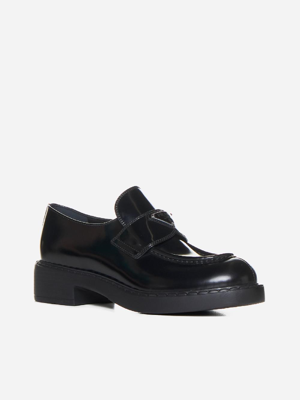 PRADA Mocassini in pelle con placca-logo Promozione Limitata
