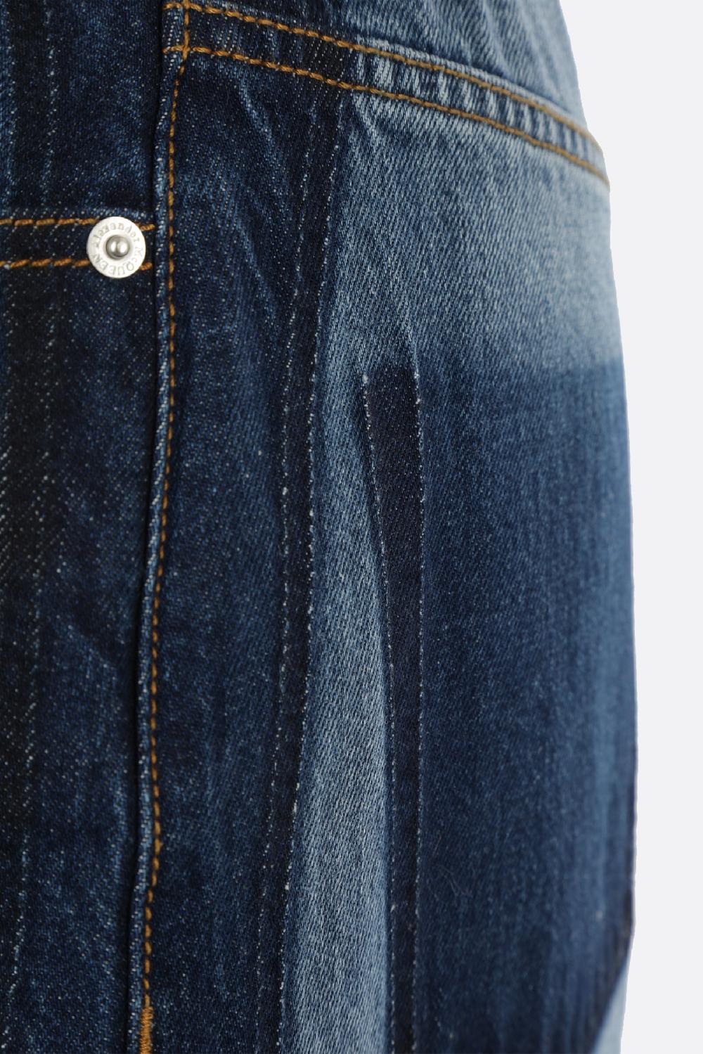 ALEXANDER McQUEEN jeans a gamba larga in denim In Vendita