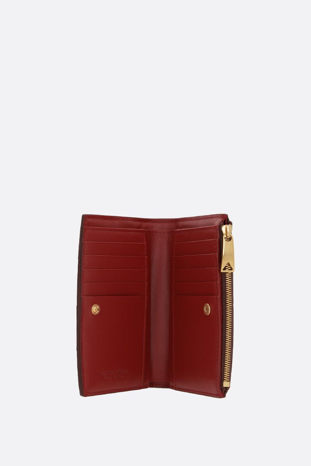 BOTTEGA VENETA portafoglio bi-fold medio Cassette in Maxi Intrecciato nappa Presa
