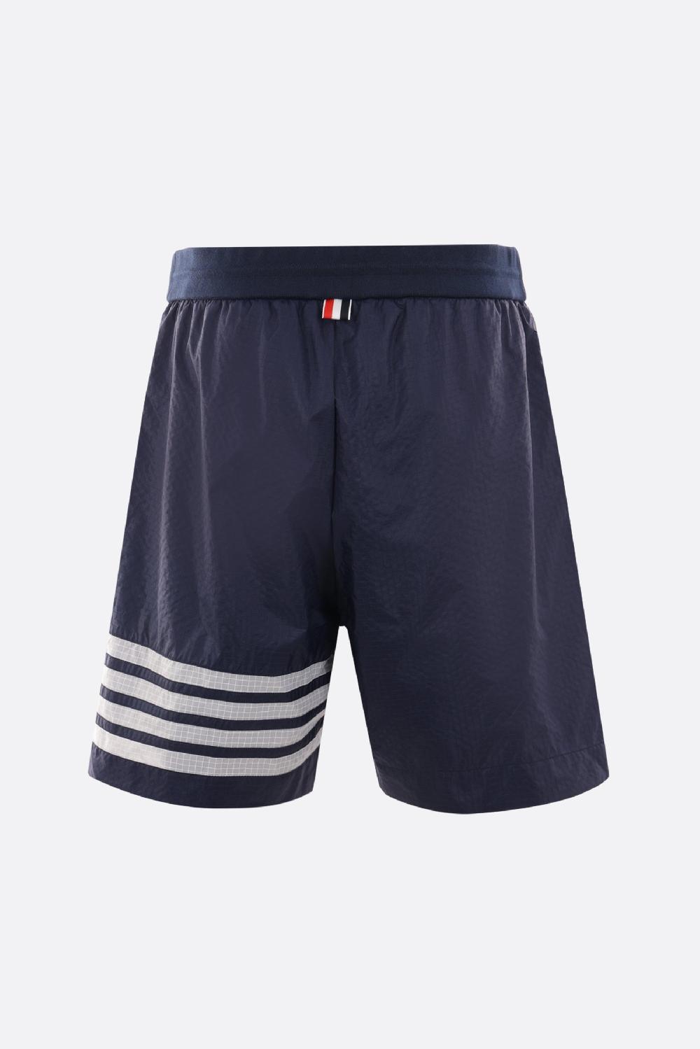 THOM BROWNE pantalone corto in nylon ripstop Ritorno libero