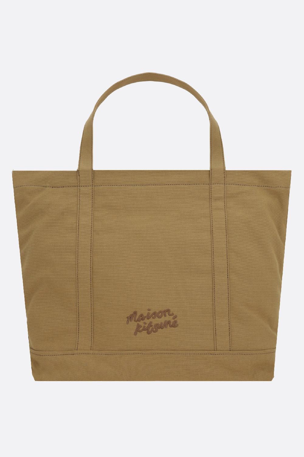 MAISON KITSUNÉ borsa tote Fox Head large in canvas Comprane uno, ottenene uno gratis