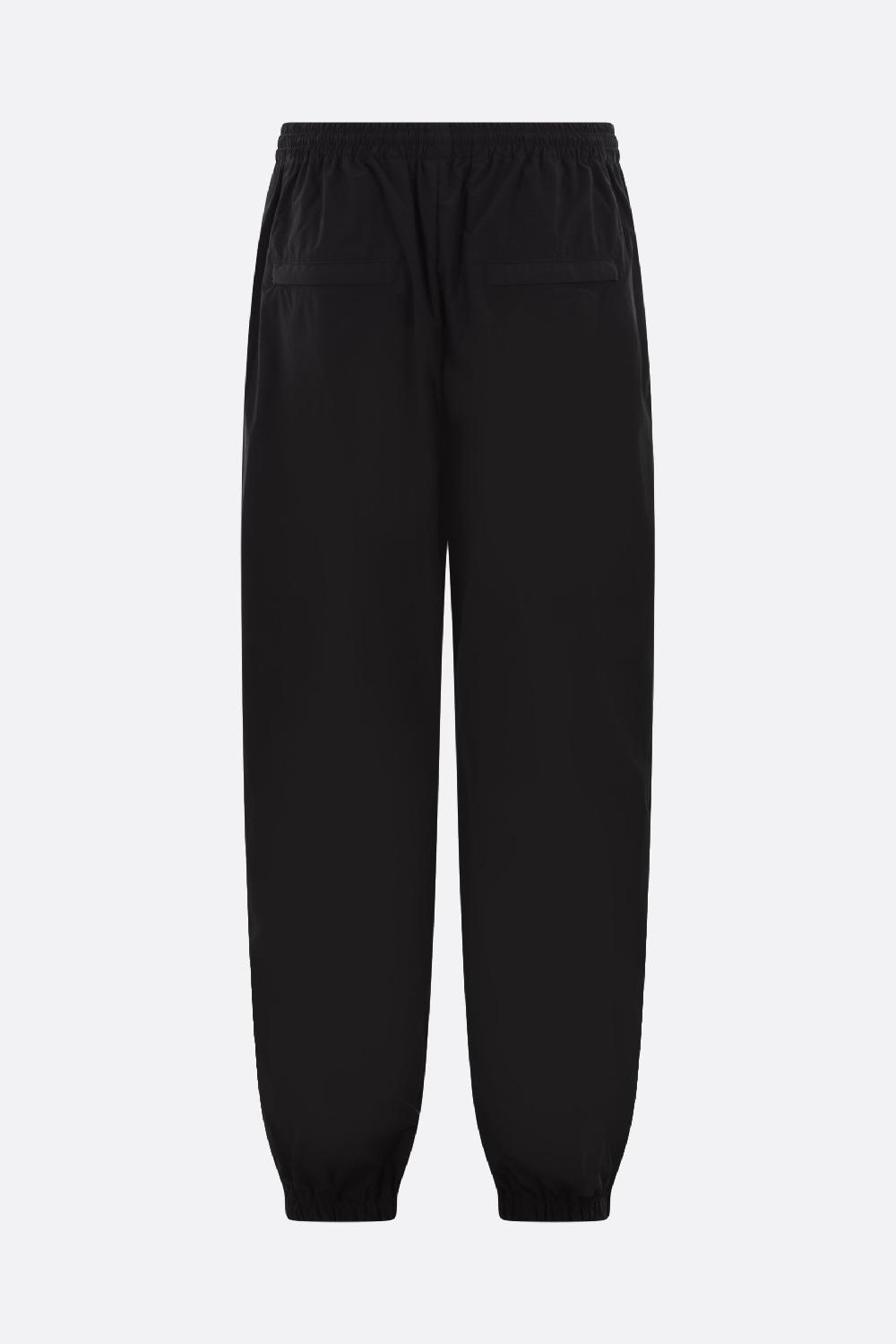 ALEXANDER WANG pantalone jogging in nylon stampa logo Puff Promozione